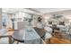 Open-concept living area with modern kitchen, dining table, and comfortable seating arrangement at 17 Ivy Gates Ne, Atlanta, GA 30342