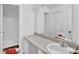 Bathroom featuring a vanity, a toilet, and a shower with a tub at 504 Rock Meadow Dr, Stone Mountain, GA 30088