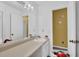 Bathroom featuring a large mirror over a vanity and a secondary room at 504 Rock Meadow Dr, Stone Mountain, GA 30088