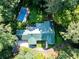 Drone shot of private pool with landscaped grounds at 5357 Highway 81, Loganville, GA 30052