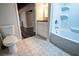 Bathroom with tiled floors, new vanity, and a shower-tub combination at 5357 Highway 81, Loganville, GA 30052