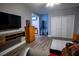 Spacious bedroom with hardwood floors, TV, and large closets at 5357 Highway 81, Loganville, GA 30052