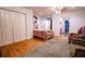 Bright bedroom with hardwood floors and walk-in closet at 5357 Highway 81, Loganville, GA 30052
