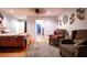 Spacious bedroom featuring hardwood floors and two upholstered chairs at 5357 Highway 81, Loganville, GA 30052