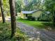 Side view of house with a driveway at 5357 Highway 81, Loganville, GA 30052