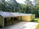 Rear view of the home showcasing the carport at 5357 Highway 81, Loganville, GA 30052
