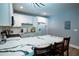Updated kitchen featuring white cabinets, granite countertops and new appliances at 5357 Highway 81, Loganville, GA 30052