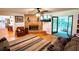 Bright and airy living room with fireplace and access to sunroom at 5357 Highway 81, Loganville, GA 30052
