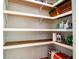 Walk-in pantry with shelving perfect for food storage at 5357 Highway 81, Loganville, GA 30052