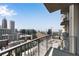 Enjoy the city skyline from this balcony with bright blue skies above at 860 Peachtree Ne St # 1806, Atlanta, GA 30308