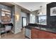 This kitchen has an integrated desk, stainless steel appliances and a modern style at 860 Peachtree Ne St # 1806, Atlanta, GA 30308