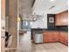 This kitchen has stainless steel appliances, black subway tiles and granite countertops at 860 Peachtree Ne St # 1806, Atlanta, GA 30308