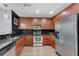 Modern kitchen boasts stainless appliances, granite counters, and lots of cabinets at 860 Peachtree Ne St # 1806, Atlanta, GA 30308