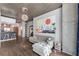 Open-concept space features a kitchen, living room, and dining area with an industrial design at 860 Peachtree Ne St # 1806, Atlanta, GA 30308