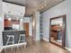 The kitchen/living space features concrete pillars, hardwood floors and an open plan at 860 Peachtree Ne St # 1806, Atlanta, GA 30308