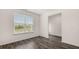 Bright bedroom featuring a large window and light-filled space at 320 Aspen Valley Dr, Loganville, GA 30052