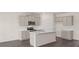 Beautiful kitchen featuring an island, stainless steel appliances, and ample cabinet space at 320 Aspen Valley Dr, Loganville, GA 30052