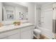 Bright bathroom featuring double sinks and a shower-tub combination at 414 Oak View Ln, Dallas, GA 30157