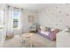 bedroom with playful polka dot wall decals and soft lighting at 414 Oak View Ln, Dallas, GA 30157