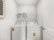 A convenient laundry room equipped with a modern washer and dryer at 414 Oak View Ln, Dallas, GA 30157