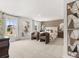Spacious main bedroom with windows, art and plush carpet, offers a retreat for relaxation at 414 Oak View Ln, Dallas, GA 30157