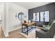 Home office featuring wood floors, a wooden desk, and stylish decor at 414 Oak View Ln, Dallas, GA 30157