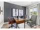 Office featuring a desk, grey accent wall, and natural lighting at 414 Oak View Ln, Dallas, GA 30157