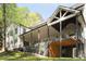 Spacious two-level deck and patio with a large covered area, ideal for outdoor dining and entertaining at 4201 Brookview Se Dr, Atlanta, GA 30339