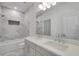 Bright bathroom featuring double vanity, marble backsplash and modern finishes at 4201 Brookview Se Dr, Atlanta, GA 30339