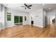 This bedroom features hardwood floors, large windows, and a sliding glass door to a balcony at 4201 Brookview Se Dr, Atlanta, GA 30339