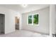 Bedroom with a large window and ensuite bath at 4201 Brookview Se Dr, Atlanta, GA 30339