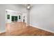 Open bedroom with hardwood floors, recessed lighting, and sliding glass doors at 4201 Brookview Se Dr, Atlanta, GA 30339