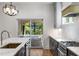 Bright kitchen with sleek countertops, modern stainless steel appliances, and a sliding door to the deck at 4201 Brookview Se Dr, Atlanta, GA 30339