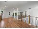 Bright loft area featuring hardwood floors and elegant chandelier at 4201 Brookview Se Dr, Atlanta, GA 30339