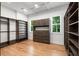 Spacious walk-in closet with custom shelving, drawers and hardwood floors at 4201 Brookview Se Dr, Atlanta, GA 30339