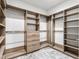 Custom walk-in closet offers ample storage with well-organized shelves and drawers at 4201 Brookview Se Dr, Atlanta, GA 30339