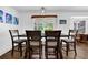 Charming dining area featuring views of the pergola and landscaping from the bay window at 5154 Meadowbrook Cir, Suwanee, GA 30024