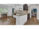 Modern kitchen featuring stone countertops and stainless-steel appliances at 5154 Meadowbrook Cir, Suwanee, GA 30024