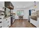 Bright kitchen featuring stainless steel appliances and breakfast bar at 5154 Meadowbrook Cir, Suwanee, GA 30024