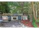Outdoor kitchen with built-in grill and prep area for backyard cookouts and entertaining at 5154 Meadowbrook Cir, Suwanee, GA 30024
