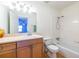 Bright bathroom featuring a tub, shower, wood-look flooring, and vanity with plenty of storage at 1150 Collier Nw Rd # G8, Atlanta, GA 30318
