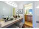 Vanity area with lots of counter space in this staged bathroom at 1150 Collier Nw Rd # G8, Atlanta, GA 30318