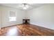 Bedroom showcasing laminate flooring, a ceiling fan, and a window at 1150 Collier Nw Rd # G8, Atlanta, GA 30318