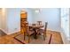 Cozy dining area features a round wooden table with seating for four at 1150 Collier Nw Rd # G8, Atlanta, GA 30318