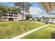Apartment complex grounds with lush green lawns and manicured landscaping at 1150 Collier Nw Rd # G8, Atlanta, GA 30318