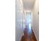 Hallway with vinyl wood flooring and multiple closets offers storage at 1150 Collier Nw Rd # G8, Atlanta, GA 30318