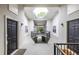 Well-lit hallway with skylight, doors to units, and staircase at 1150 Collier Nw Rd # G8, Atlanta, GA 30318
