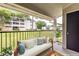 Cozy outdoor patio with comfortable seating and a view of the well-manicured grounds at 1150 Collier Nw Rd # G8, Atlanta, GA 30318