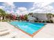 Inviting community pool with plenty of lounge chairs and well-maintained landscaping at 1150 Collier Nw Rd # G8, Atlanta, GA 30318
