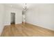 Bedroom with wood floors and adjoining room and closet at 3735 Hamilton Mill Rd, Buford, GA 30519